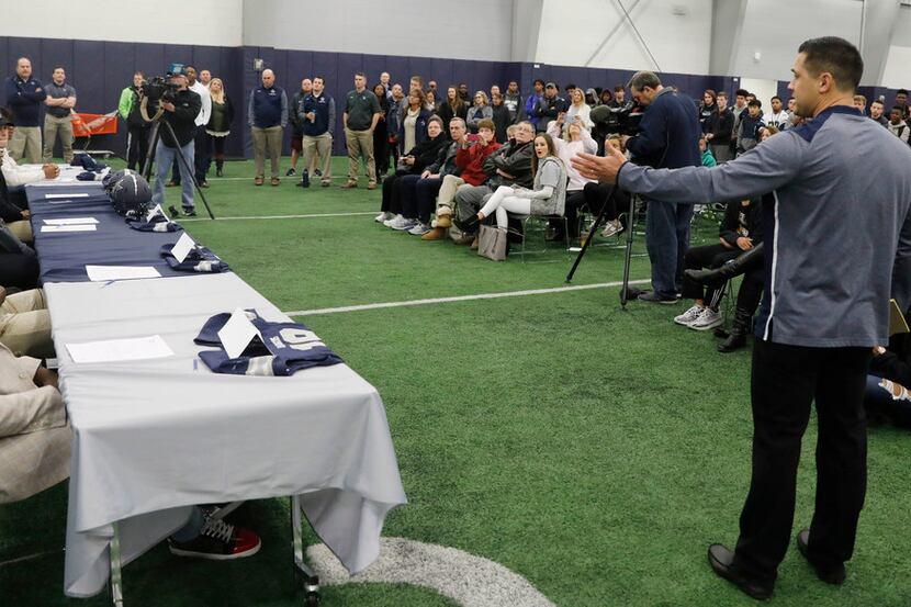 Frisco Lone Star High School Jeff Rayburn acknowledges six of his football players, from...