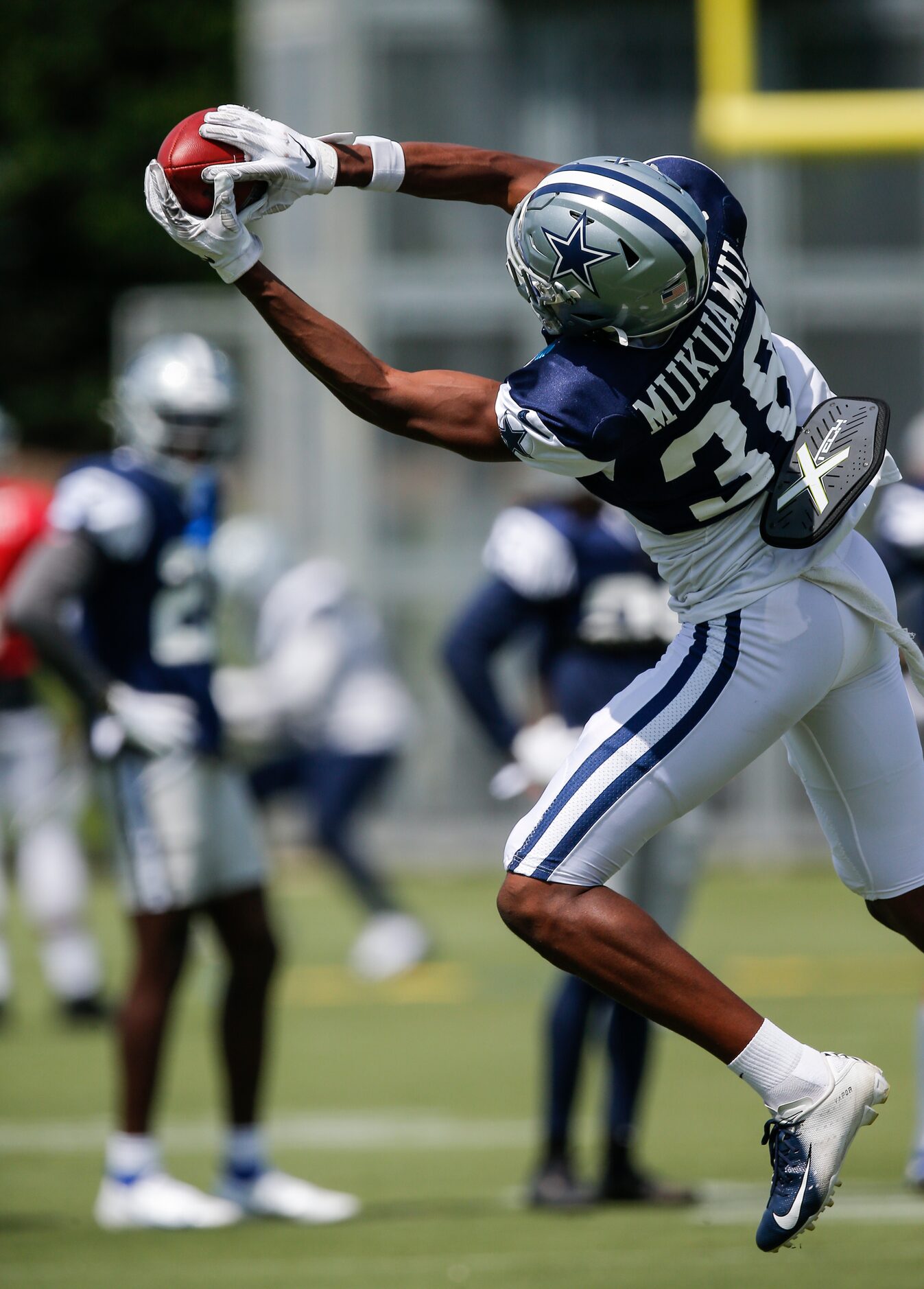 Dallas Cowboys cornerback Israel Mukuamu (38) catches a pass during practice at The Star in...