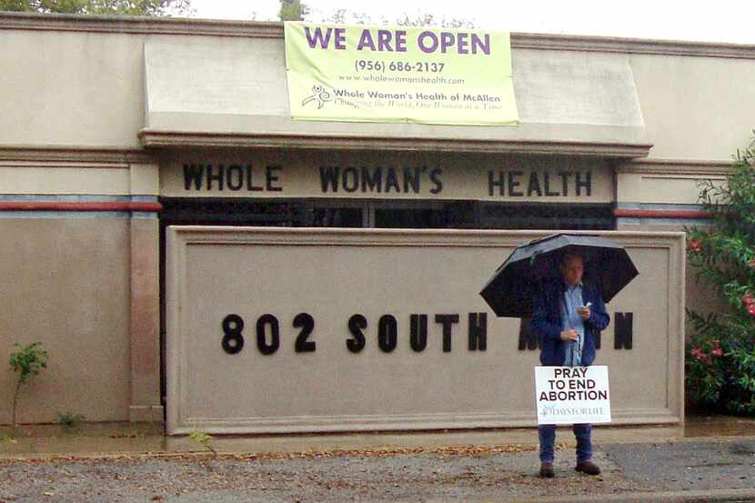  A protestor in McAllen, Texas stands in front of Whole Woman's Health, which is lead...