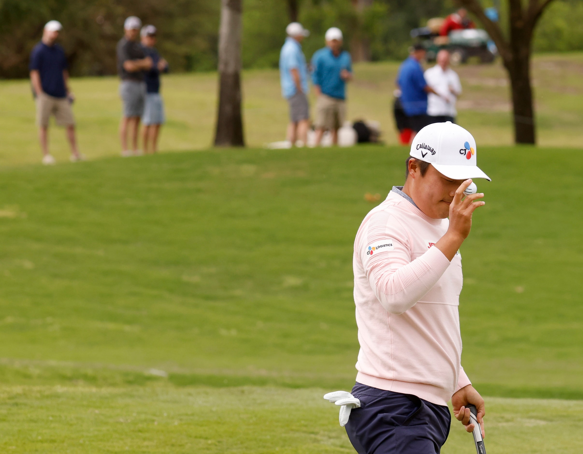 Kyoung-Hoon Lee acknowledges the crowd after hitting a birdie on the 6th hole during round 2...