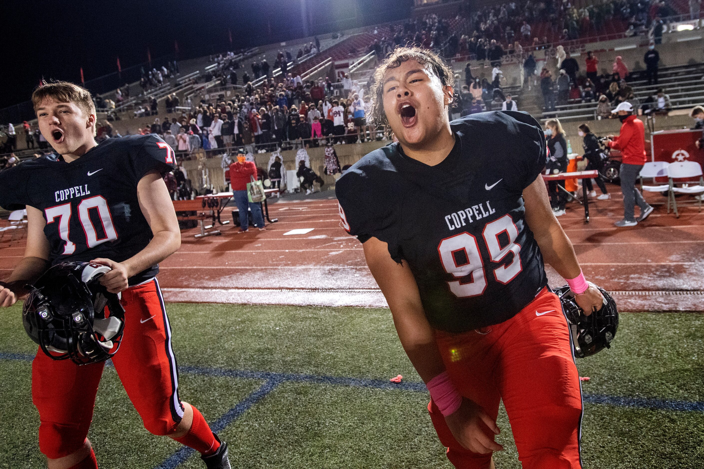 Coppell senior defensive lineman Fernando Pando (99) and junior offensive lineman Jake...