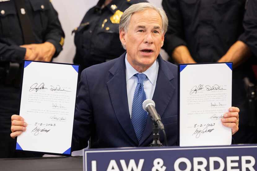 Texas Governor Greg Abbott speaks after signing two recent bills that address street racing...