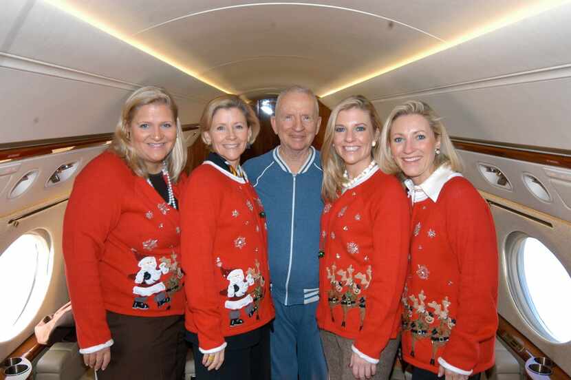 Ross Perot is surrounded by daughters (from left) Suzanne McGee, Nancy Perot, Katherine...
