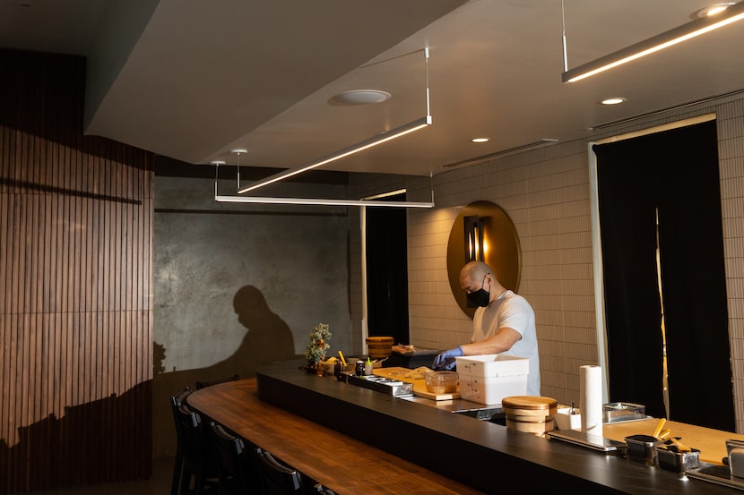 Sous chef William Yoon prepares fish at Shoyo.