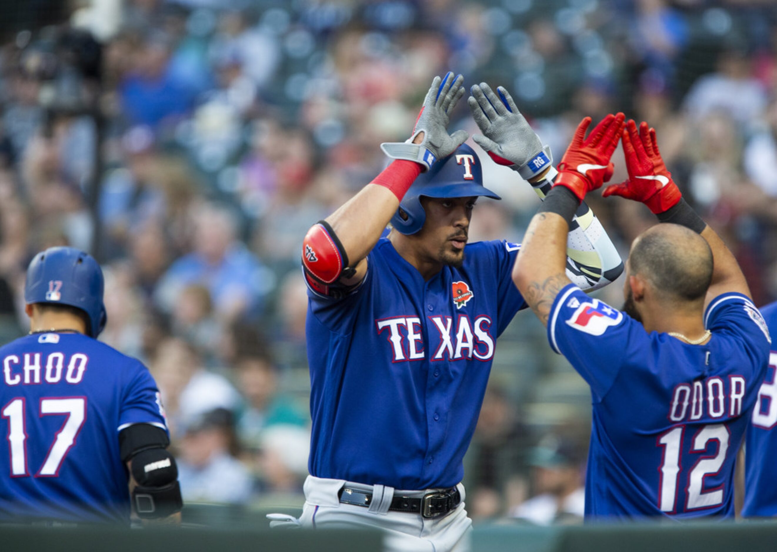 SEATTLE, WA - MAY 27:  Ronald Guzman #11 of the Texas Rangers celebrates his solo home run...