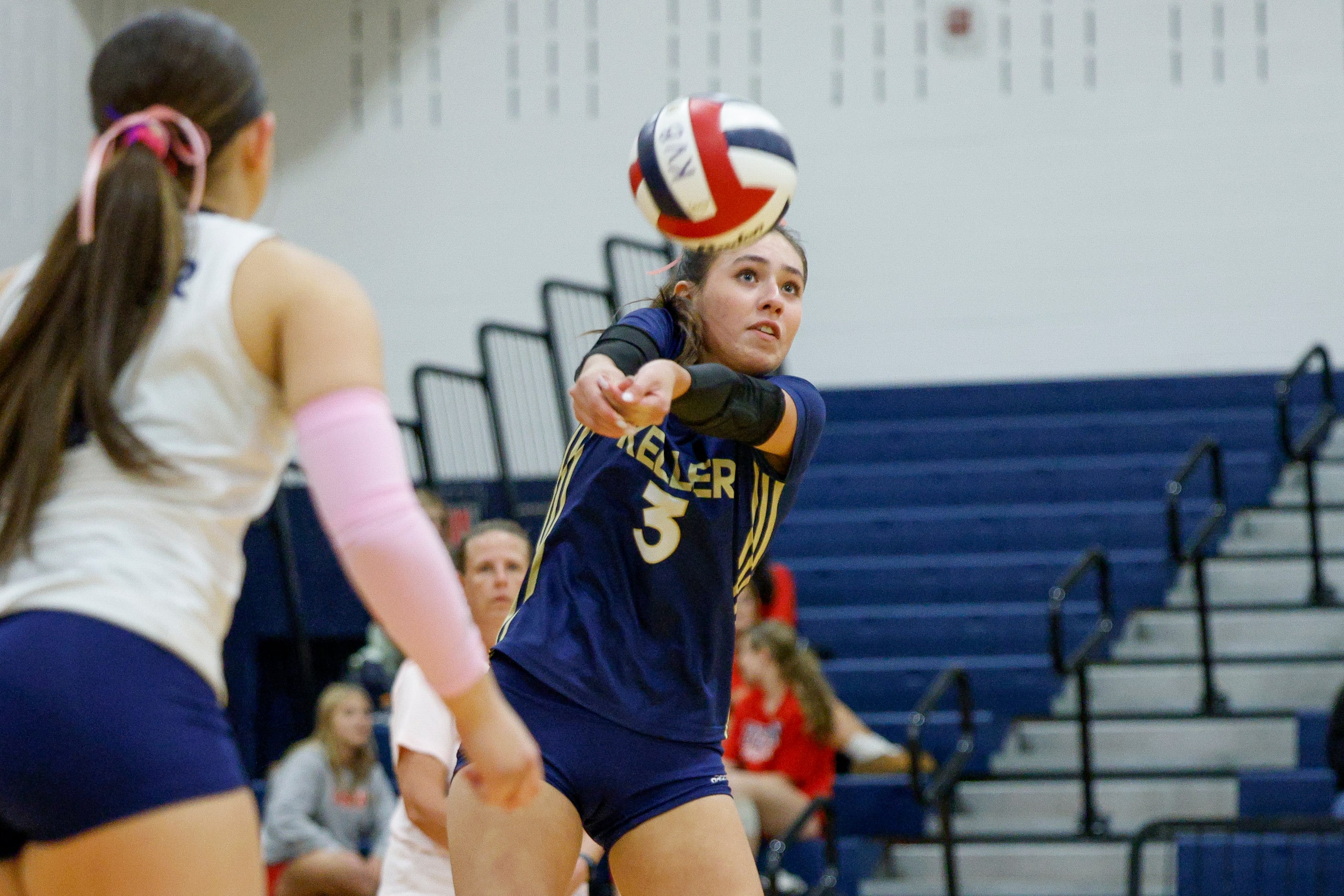 Keller's Ansley Shafer (3) passes the ball to a teammate during a high school volleyball...