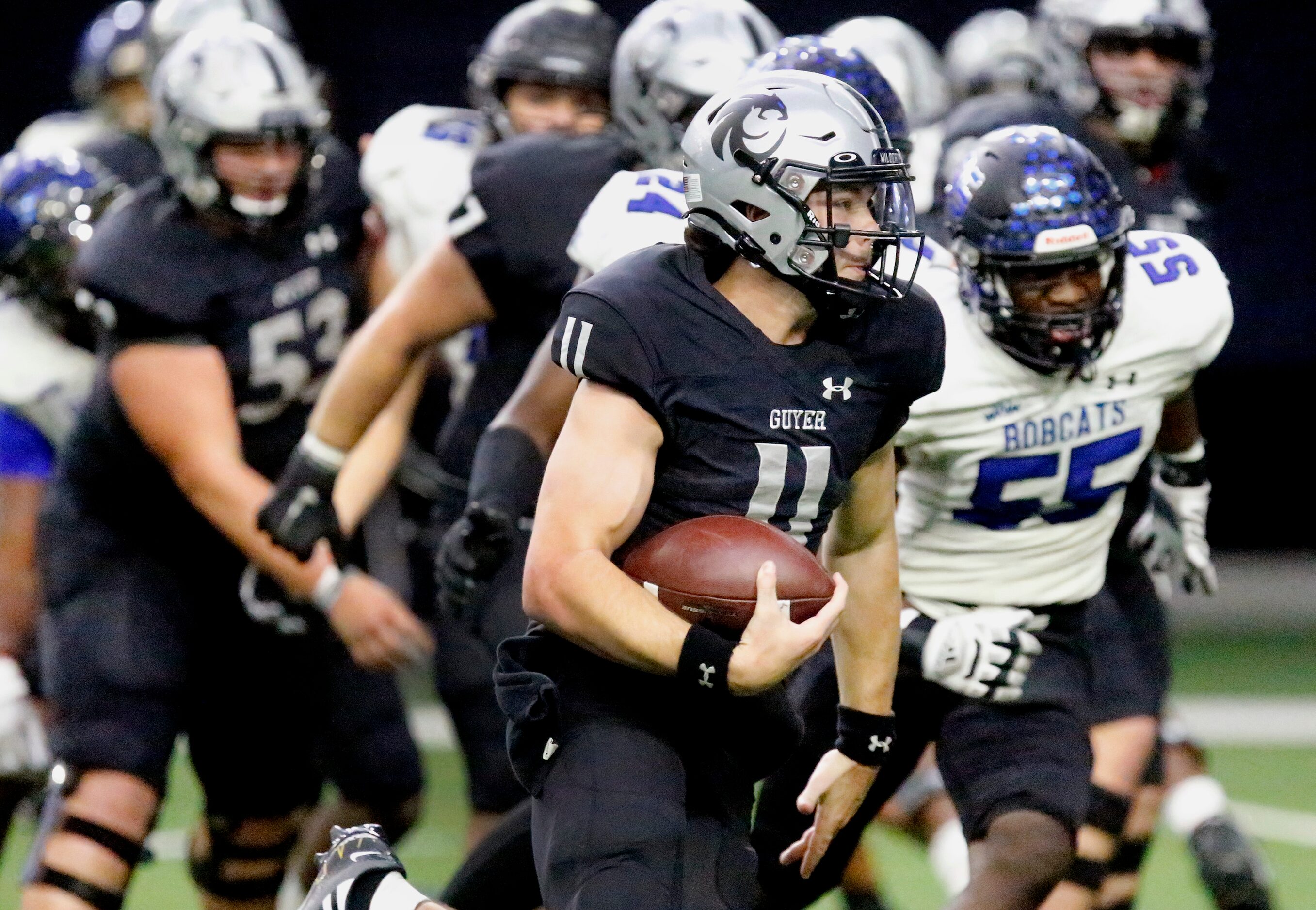 Guyer High School quarterback Jackson Arnold (11) runs fro a touchdown during the first half...