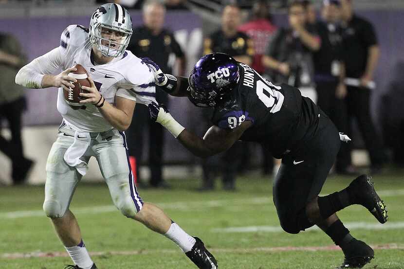 Kansas State Wildcats quarterback Collin Klein (7) is sacked by TCU Horned Frogs defensive...