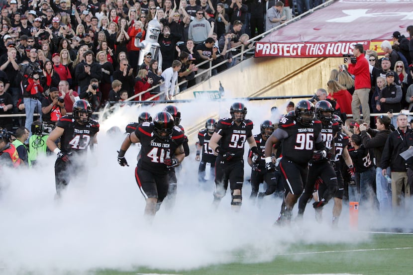 The Texas Tech Red Raiders take the field  at Jones AT&T Stadium against Oklahoma State.