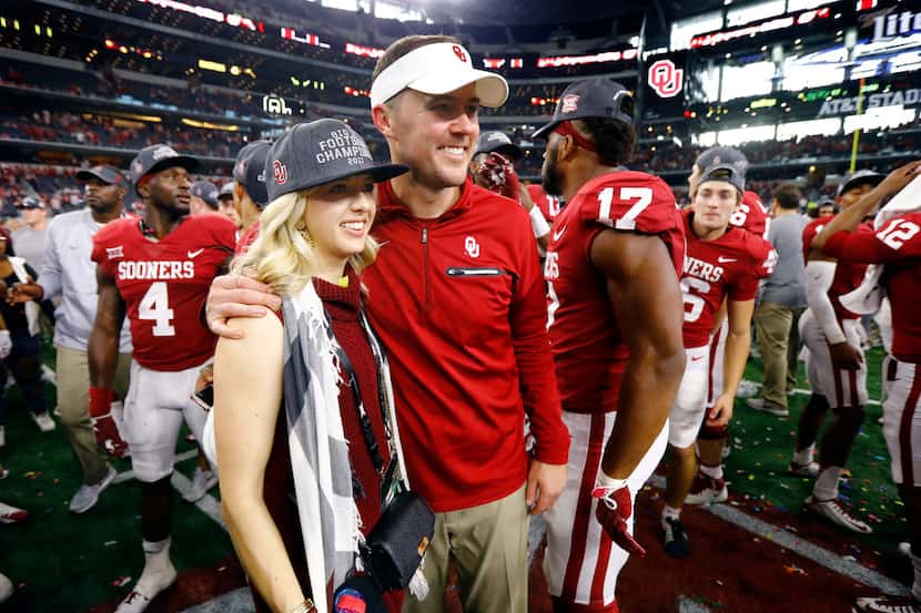 Oklahoma Sooners head coach Lincoln Riley poses for a photo with his wife Caitlin Buckley as...