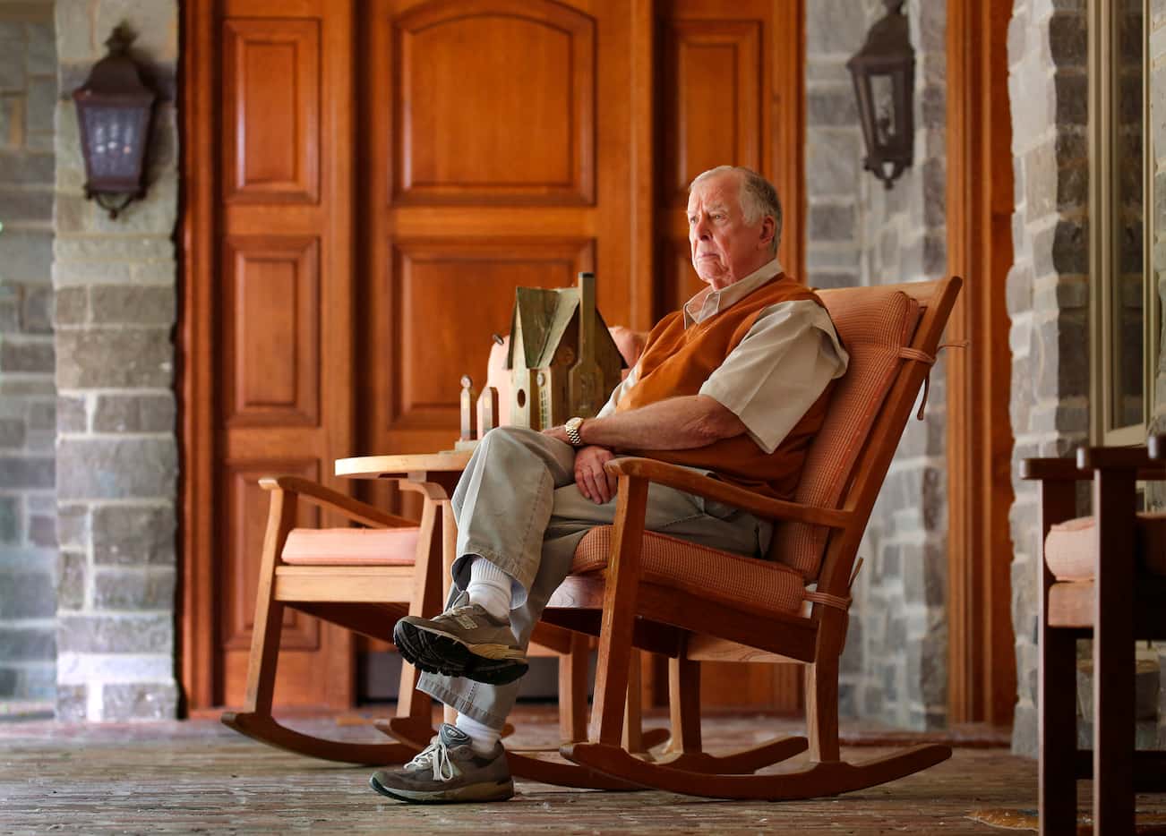Dallas businessman and philanthropist T. Boone Pickens, on a patio at the lodge, acquired...