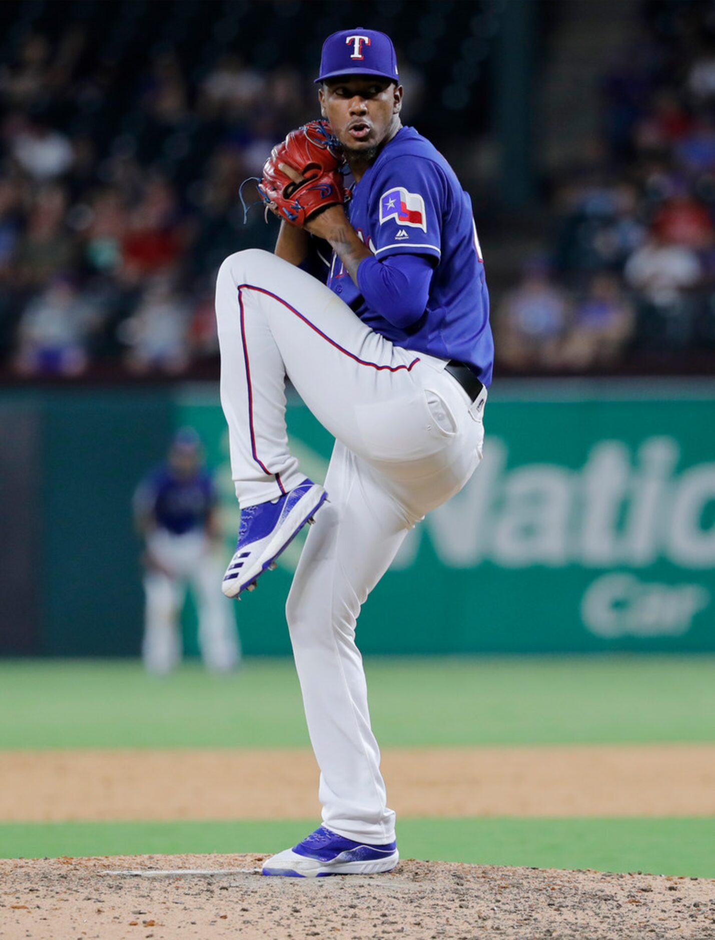 Texas Rangers relief pitcher Emmanuel Clase throws to the Minnesota Twins in the ninth...