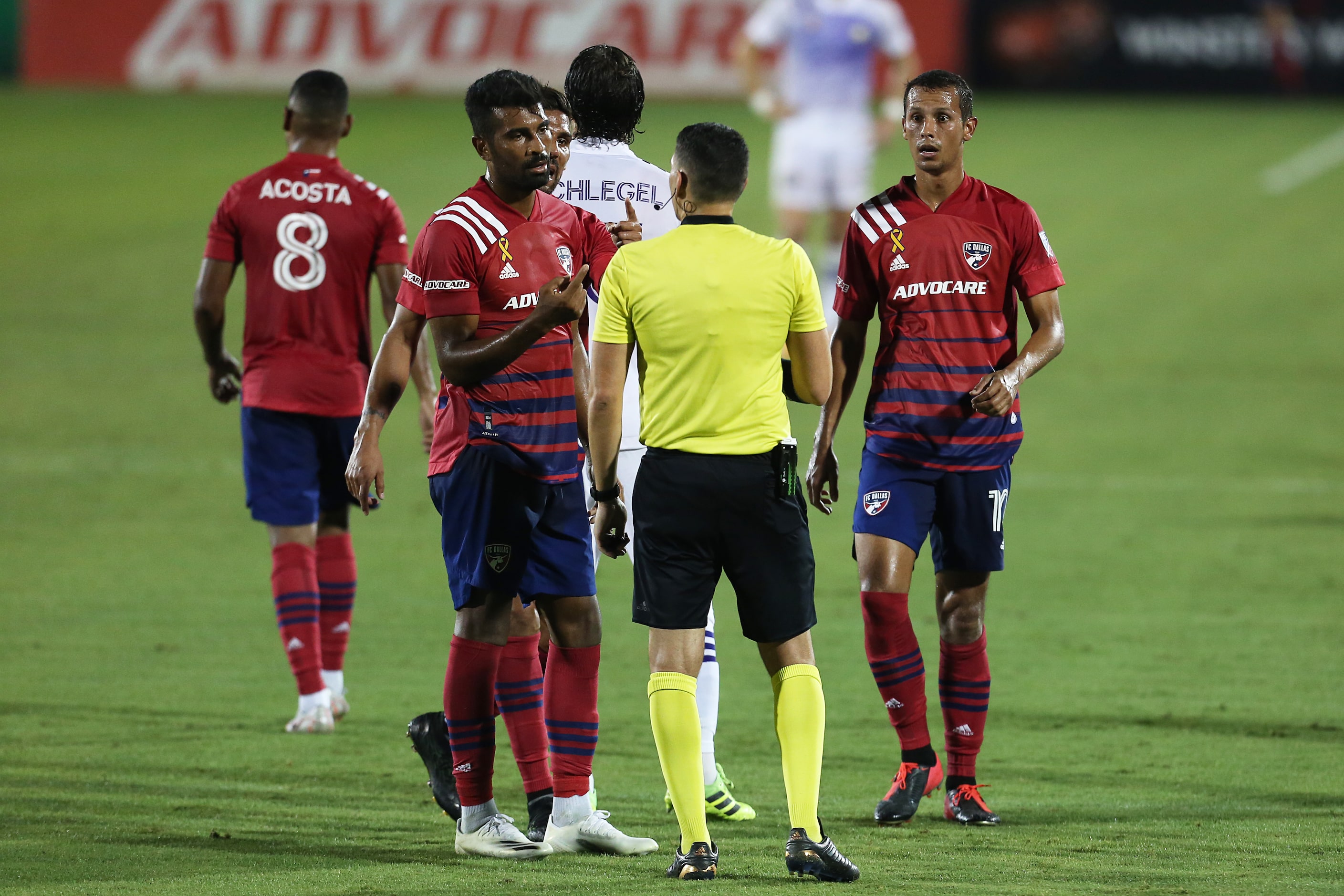 FRISCO, TX - SEPTEMBER 27: Thiago Santos #5 and Andres Ricaurte #10 of FC Dallas argue...