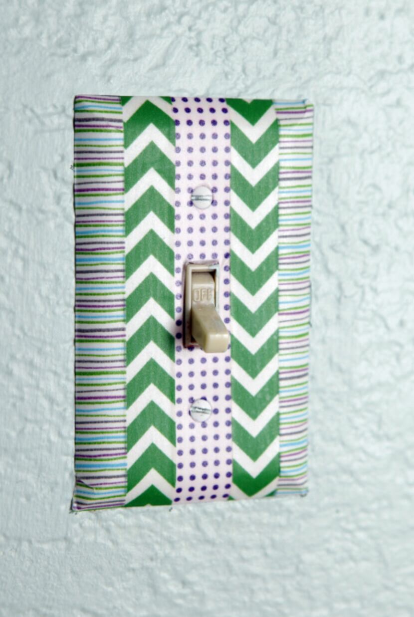 A light switch covered in washi tape done by Cassie Freeman of Plano