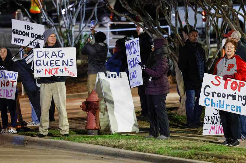 Right-wing protesters demonstrate outside an all-ages drag show at Texas Trust CU Theatre in...