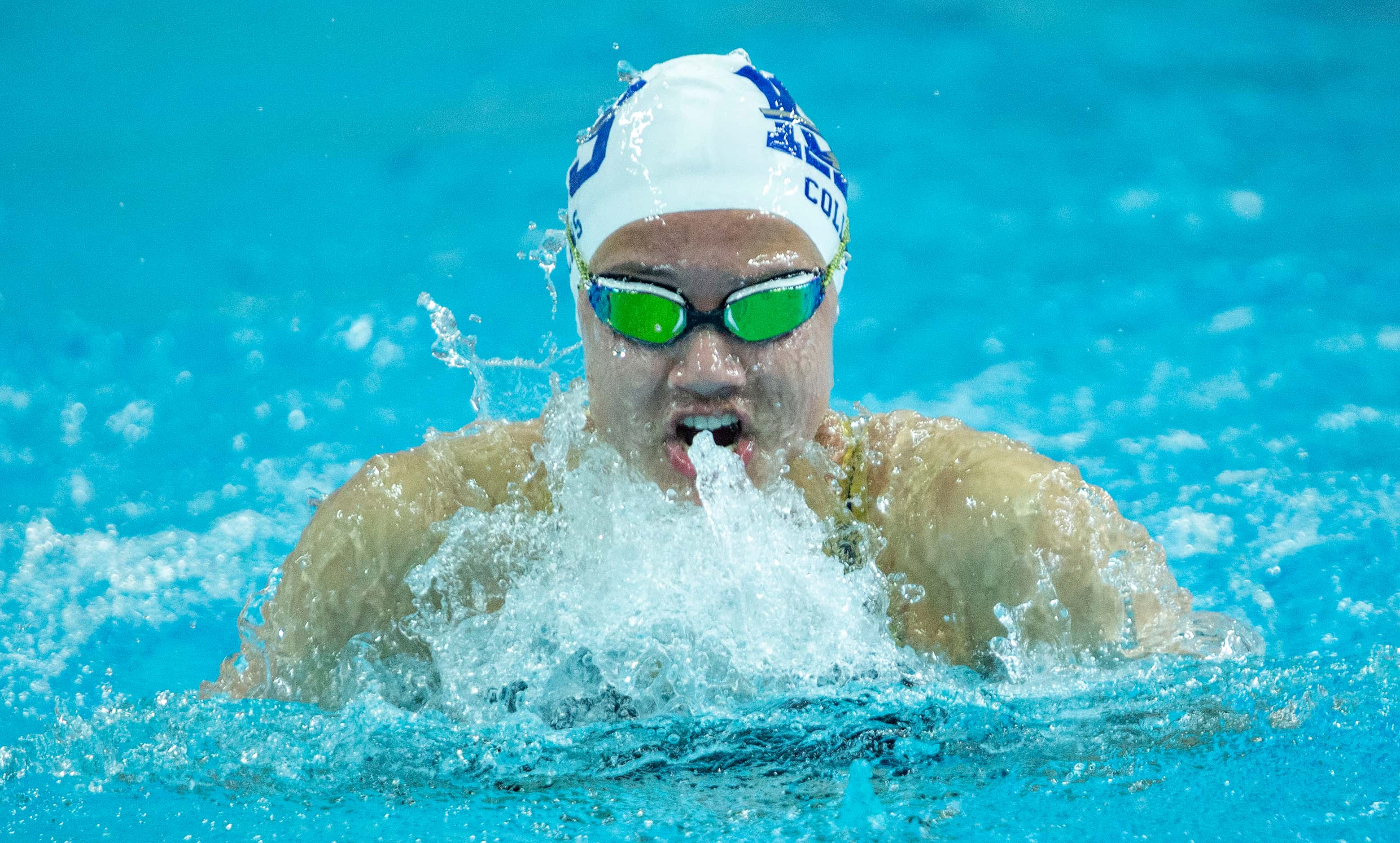 Keller’s Avery Collins competes in the girls 100-yard breaststroke race during the 6A...