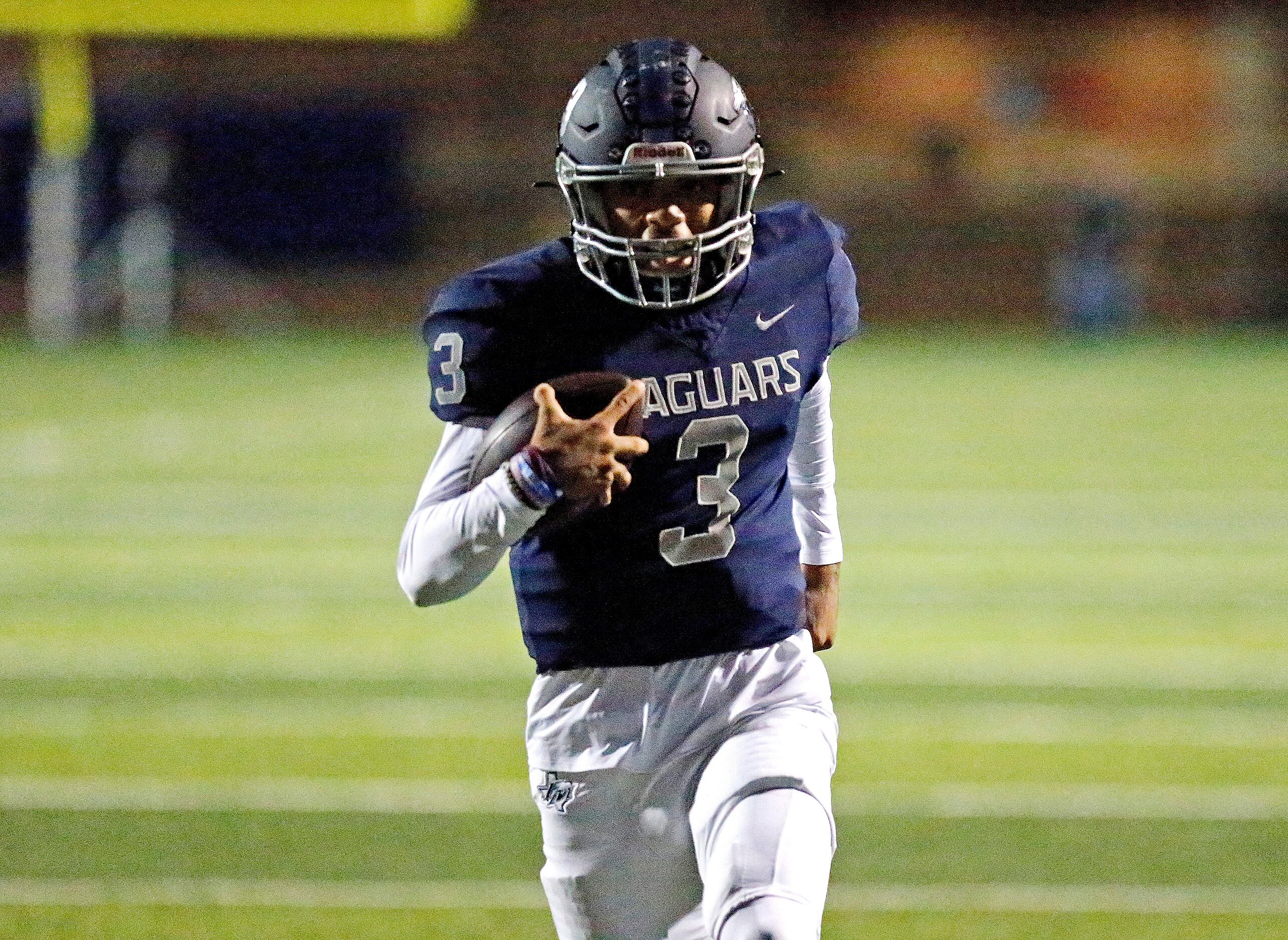 Flower Mound High School quarterback Nick Evers (3) runs untouched into the end zone during...