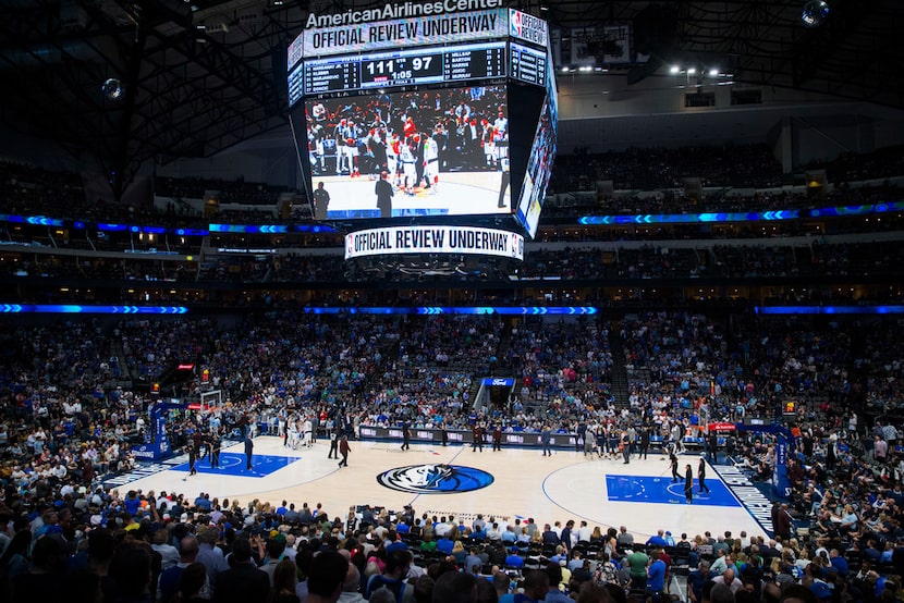 A mostly full arena in the fourth quarter of an NBA game between the Dallas Mavericks and...