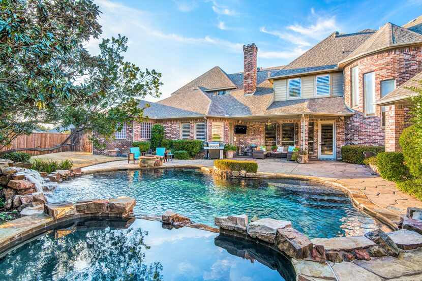 The two-story custom residence at 4825 Northshore Drive in Frisco is listed for $850,000.