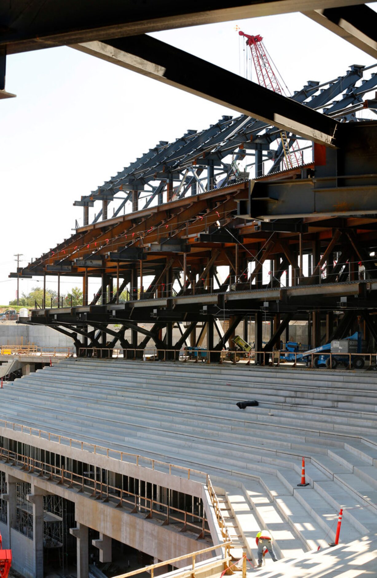 The concrete main concourse seating (lower) and the steel framework of the upper concourse...