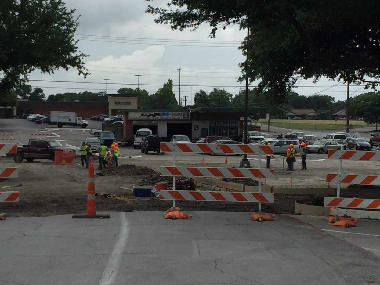 Flood control and storm drainage improvements being worked on at Wynnewood Village in Oak...