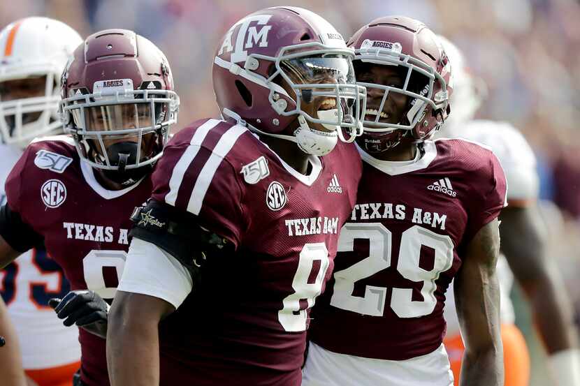 Texas A&M defensive lineman DeMarvin Leal (8) reacts after tackling UTSA quarterback Lowell...