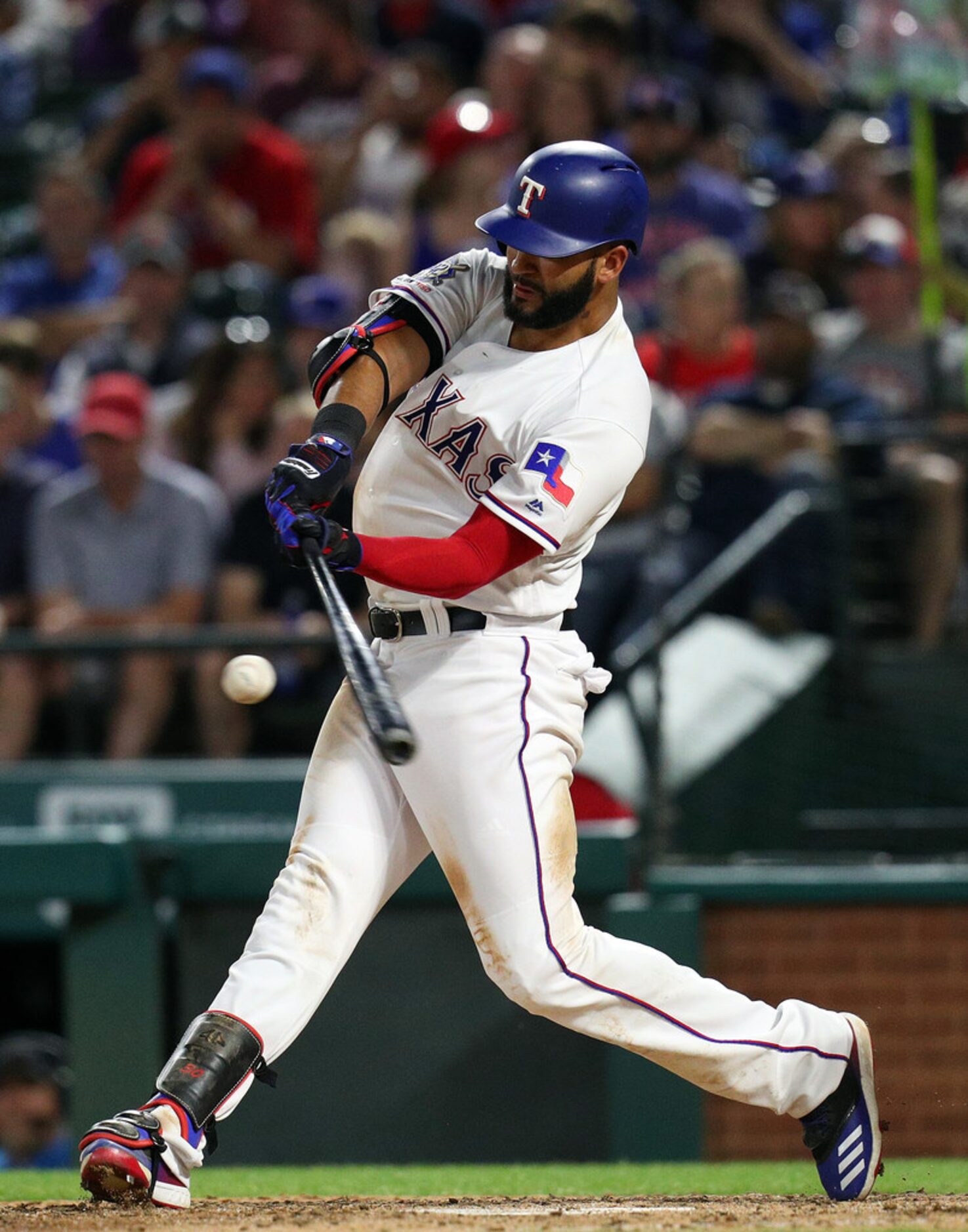 ARLINGTON, TEXAS - APRIL 15: Nomar Mazara #30 of the Texas Rangers hits a single in the...