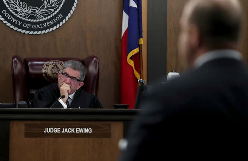 Galveston County Court No. 3 Judge Jack Ewing listens to an attorney's objection to a...