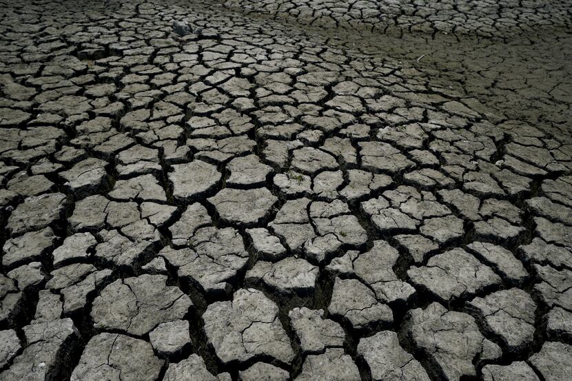 Dry, cracked land is visible in The Boca reservoir that supplies water to the northern city...