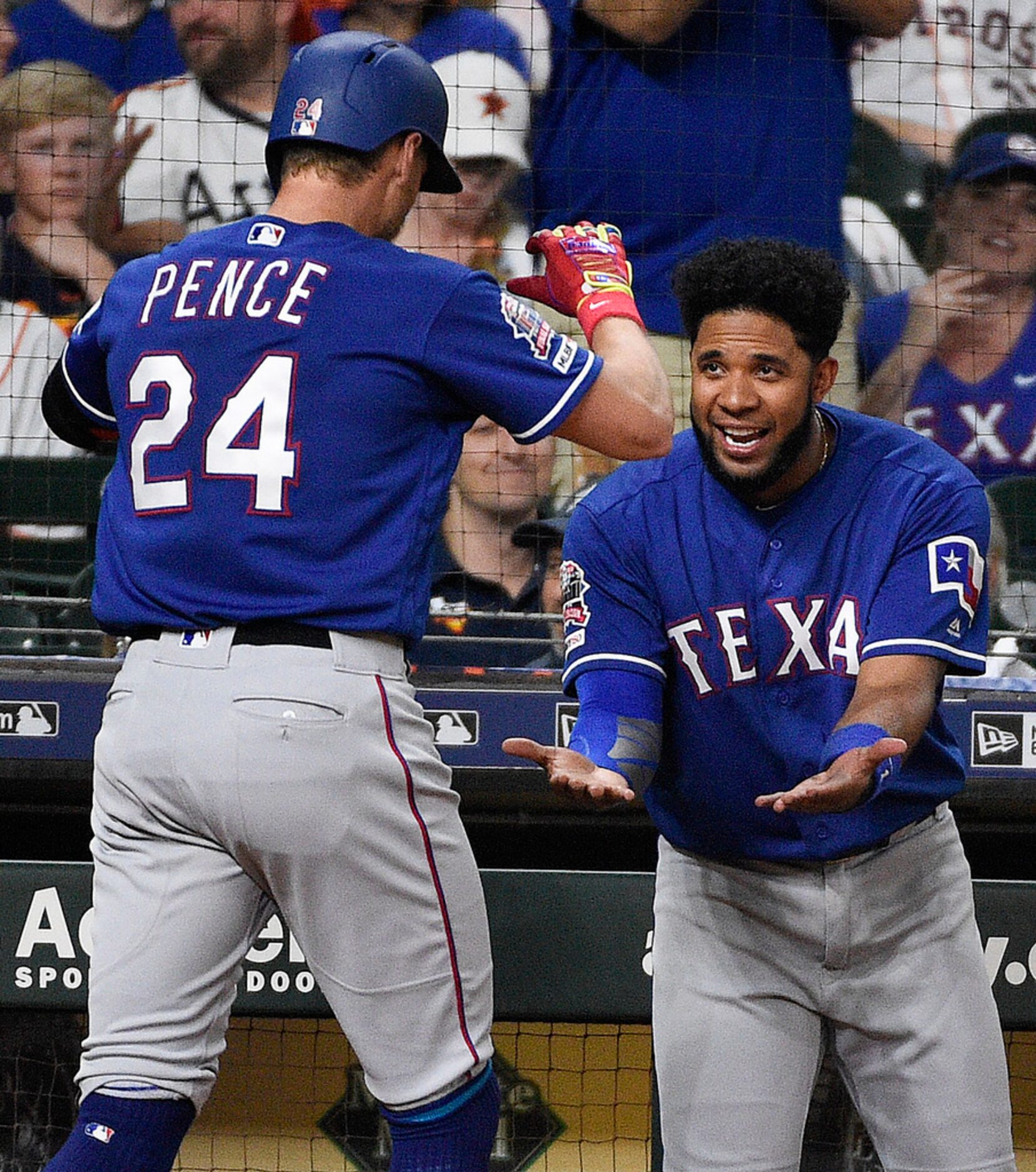 Texas Rangers' Hunter Pence (24) celebrates his solo home run off Houston Astros starting...