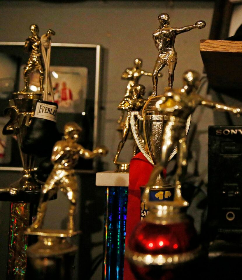   A table  in the corner of the gym displays Rafael’s trophies. His first trophy was won...