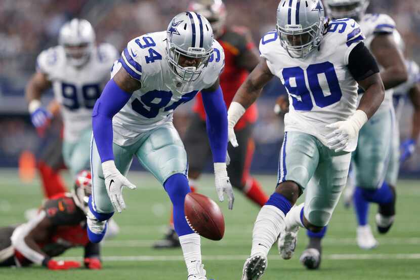 Dallas Cowboys defensive end Randy Gregory (94) and Dallas Cowboys defensive end Demarcus...