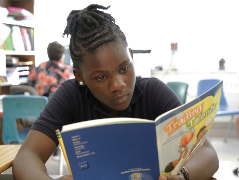 R'reanna Wooten, 11, reads in her fourth-grade writing class at George W. Carver Creative...