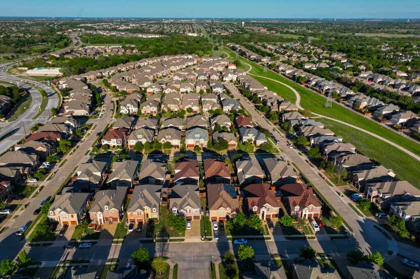 Aerial view of homes in the Harrington Mills subdivision on Saturday, April 8, 2023, in Plano.