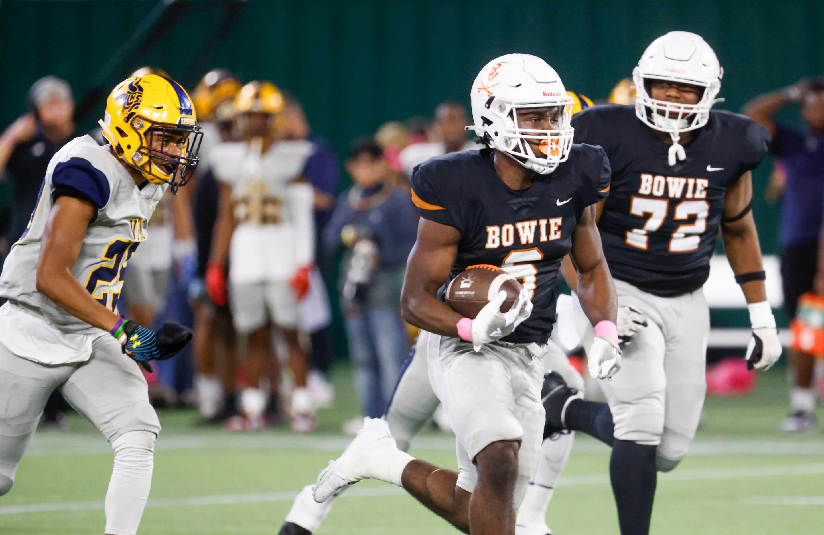 James Bowie High’s Darrion Bowers (6) runs for a touchdown during the first half of a...