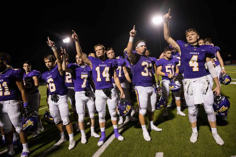 Sanger High School players celebrate after winning against Lake Worth High School on Sept....