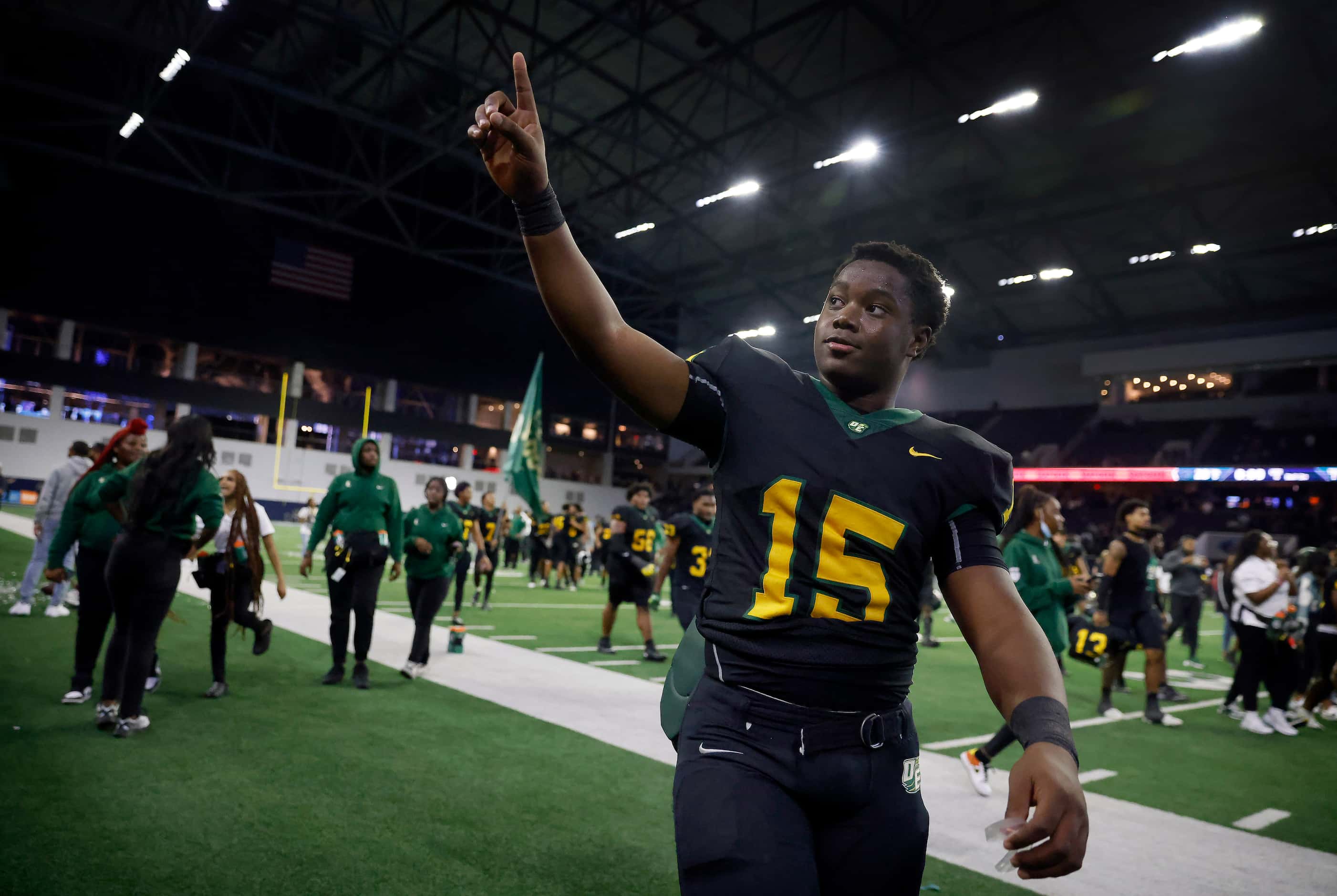 DeSoto quarterback Darius Bailey (15) points to the fans after defeating Denton Guyer in the...