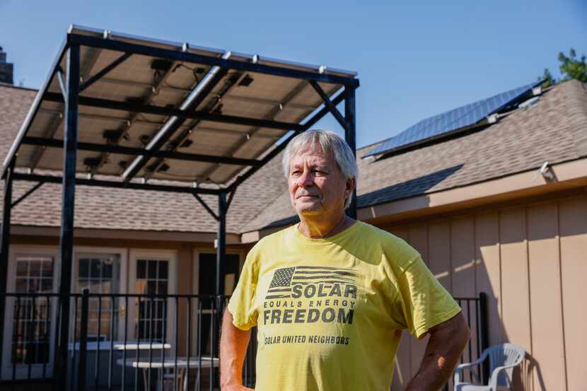 Larry Howe, co-founder of Plano Solar Advocates, installed solar panels on his rooftop and...