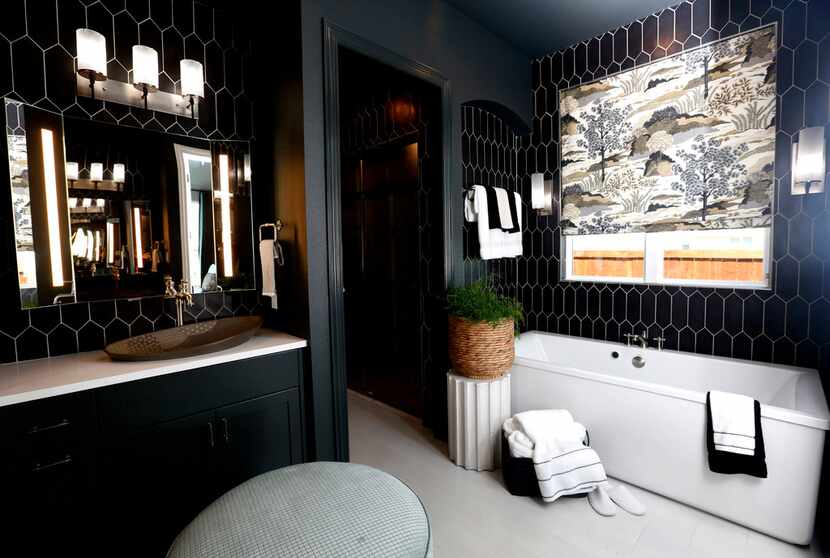 Black walls in a bathroom? It works, says the designer Tiffany Brooks.
