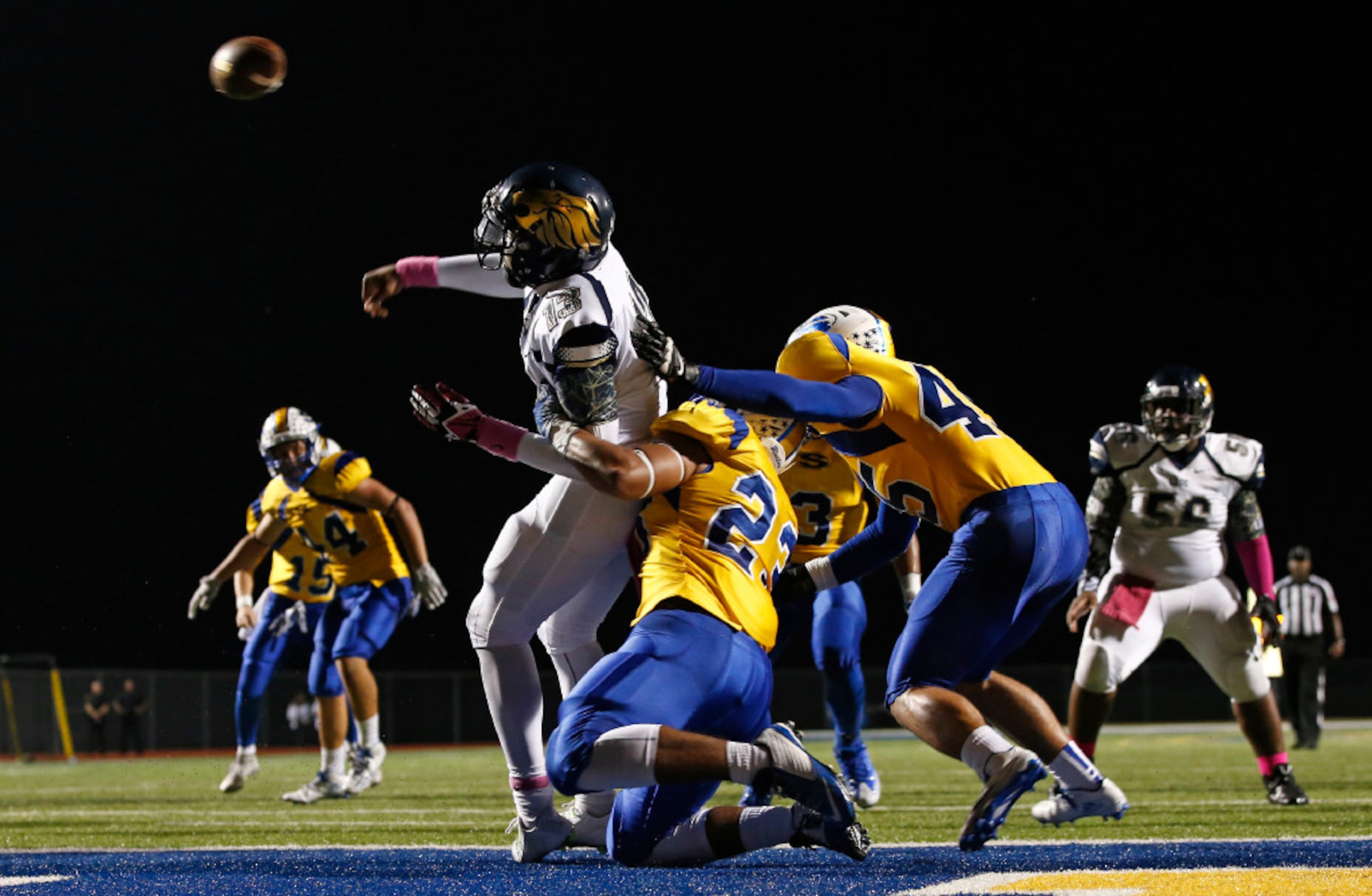 Life Oak Cliff quarterback Chayce Harris (13) gets the pass off as Sunnyvale linebacker Kyle...