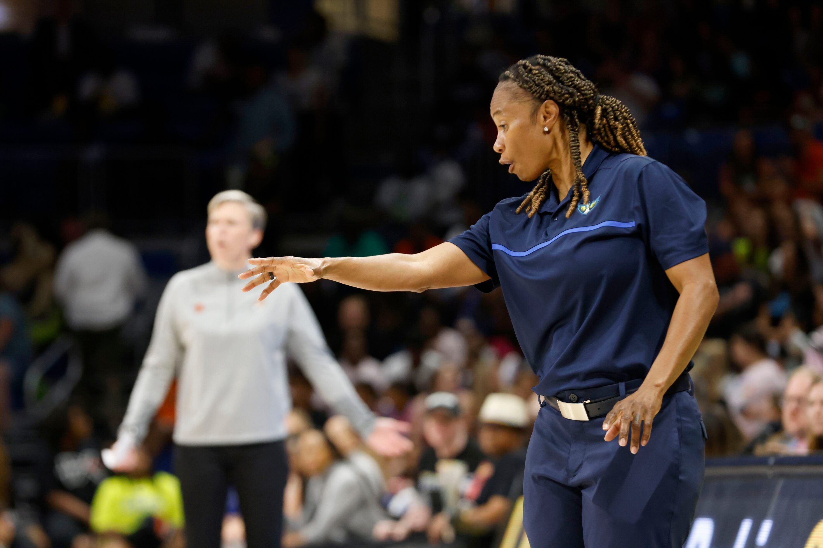 Dallas Wings head coach Vickie Johnson reacts to a call as they played the Phoenix Mercury...