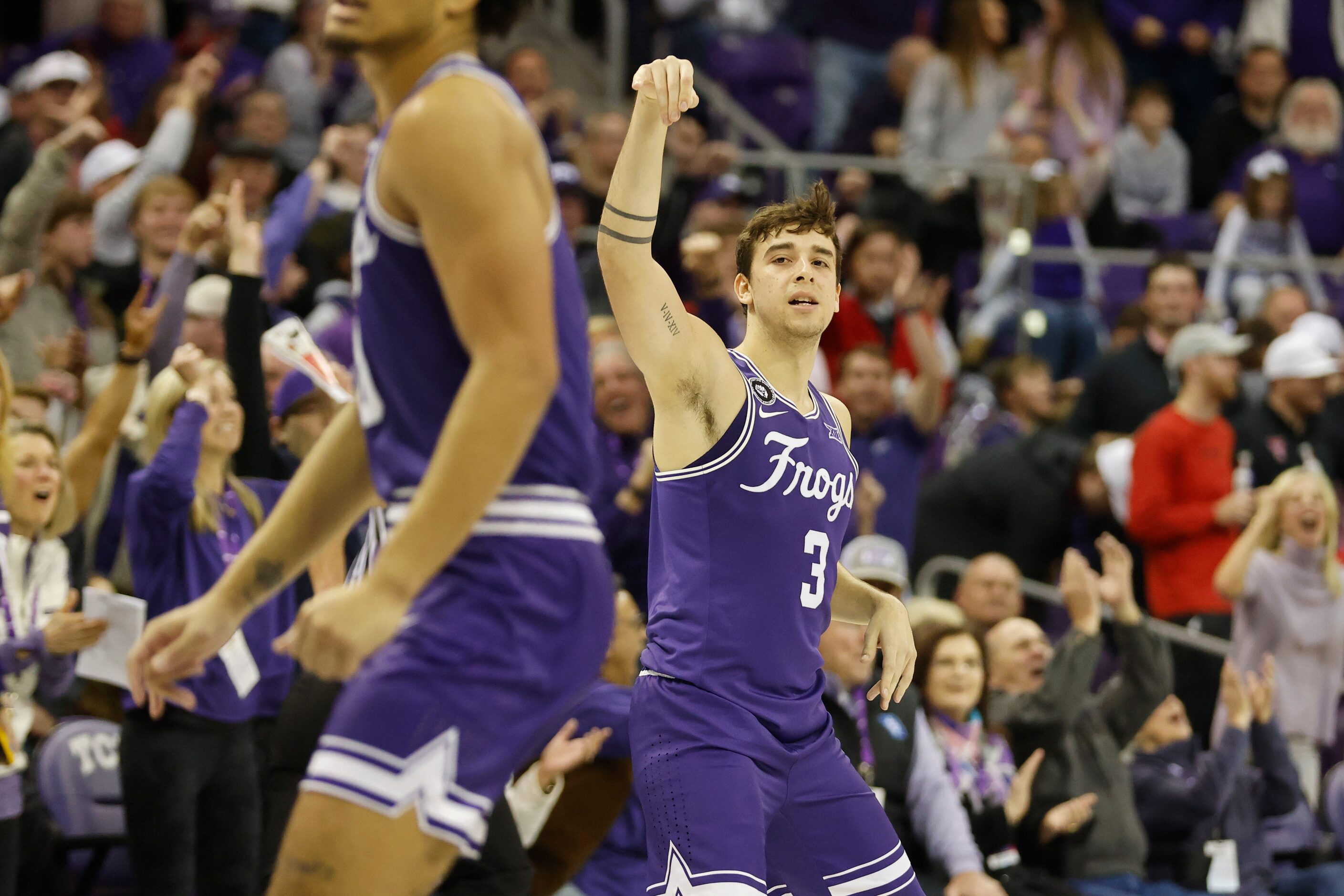 TCU guard Francisco Farabello (3) celebrate his three-point shot to give TCU the lead...