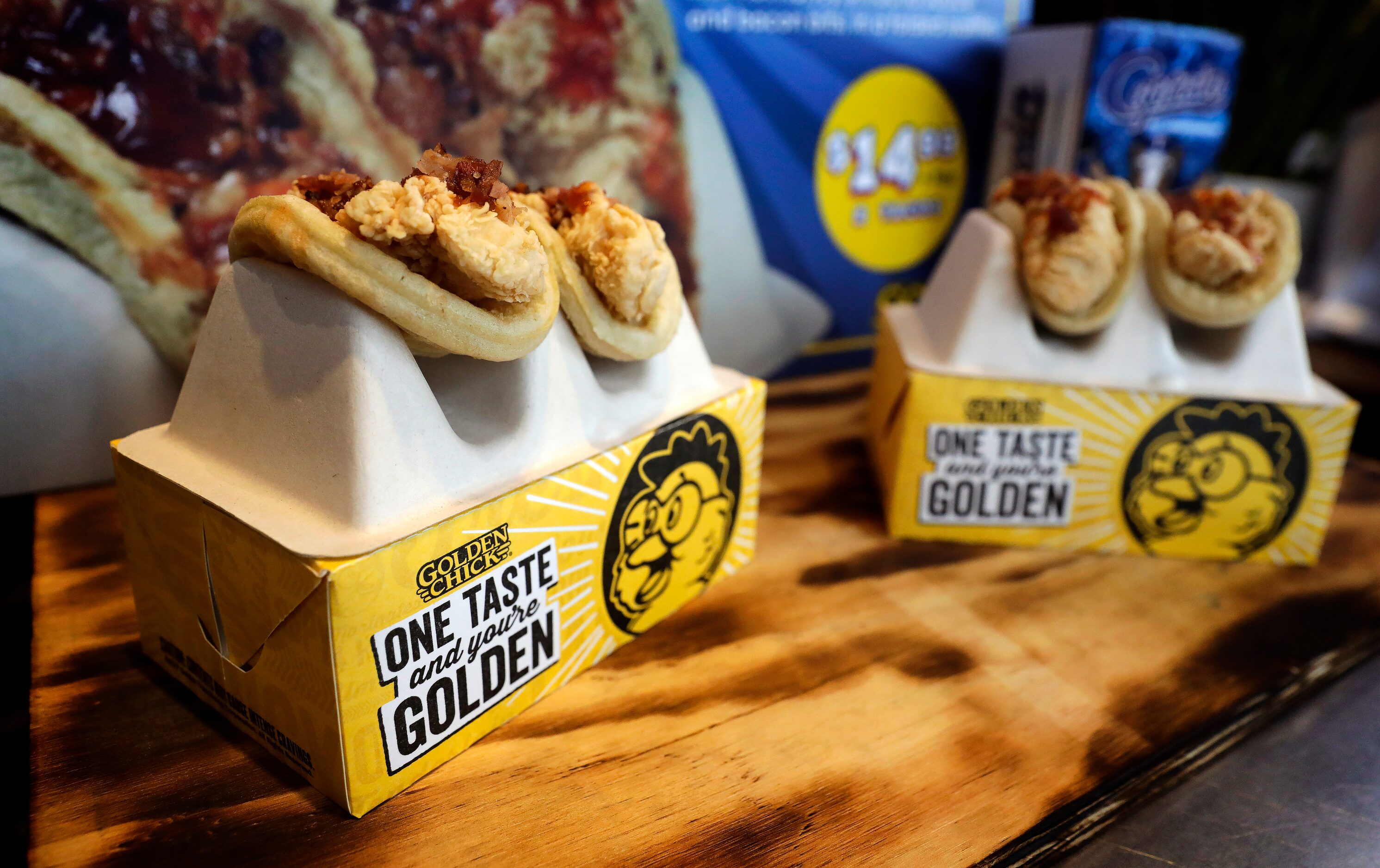 The Texas Rangers unveiled Golden Chick Chicken & Waffle Tacos, a new menu item for the 2024...