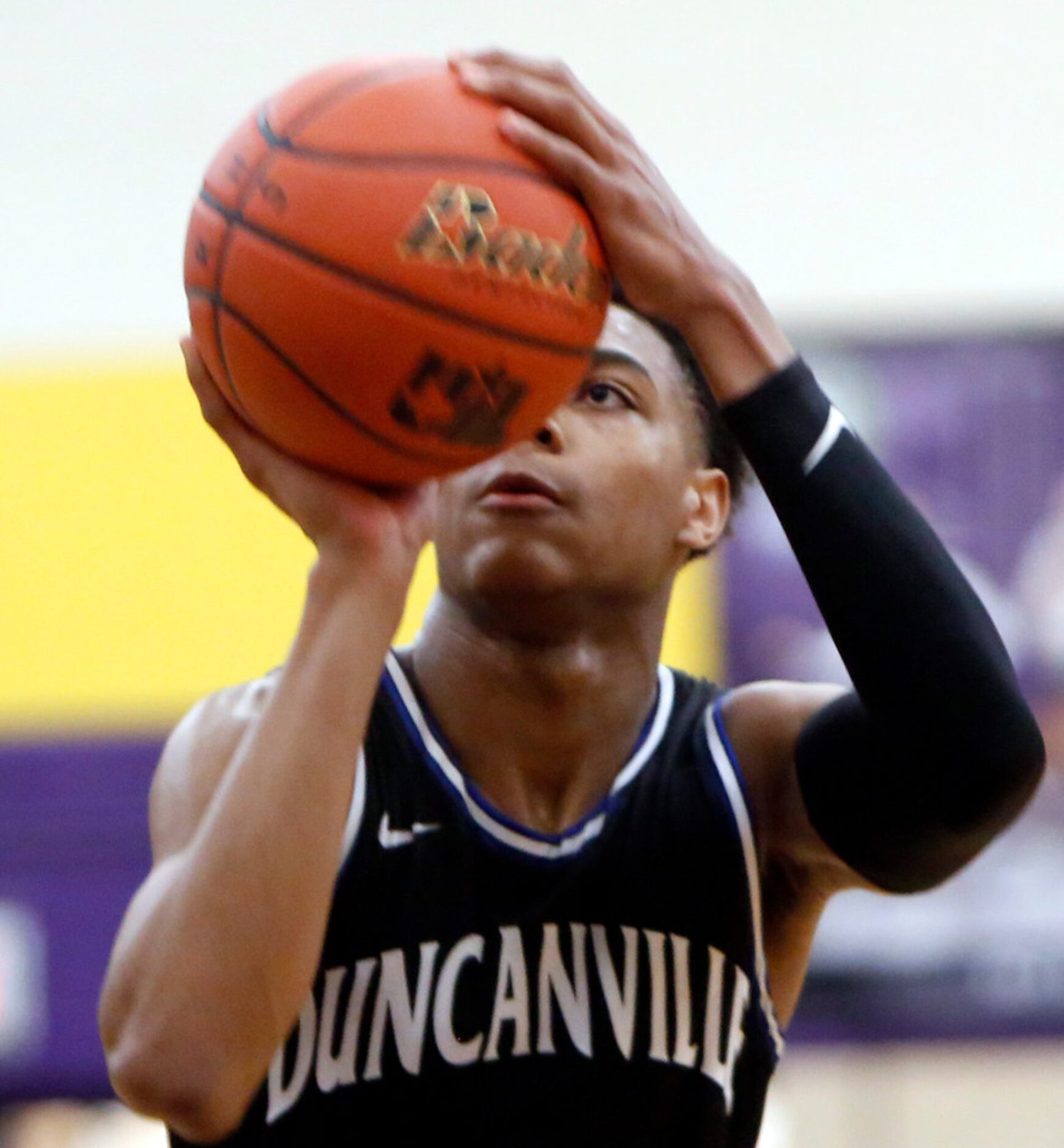 Duncanville's Zhuric Phelps (0) focuses on a free throw during the overtime period of play....