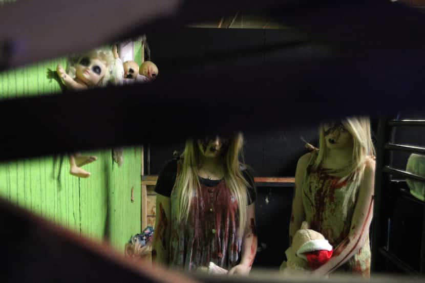 Twins Ashleigh Leavey and Staci Leavey perform at Moxley Manor Haunted House. 