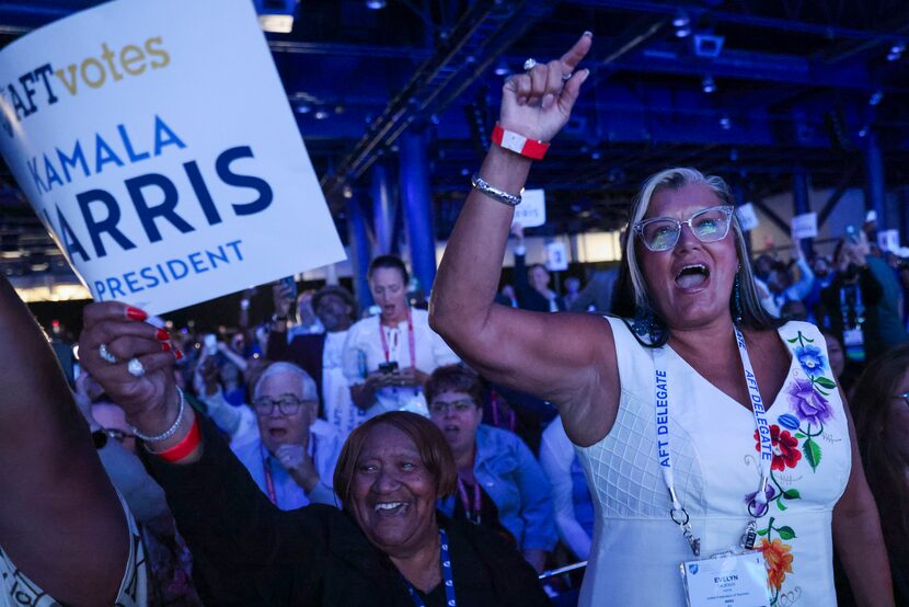 AFT delegate Evelyn DeJesus cheers as Vice President Kamala Harris shares her remarks during...