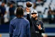 Dallas Cowboys quarterback Dak Prescott (4) throws a pass before an NFL game against the...