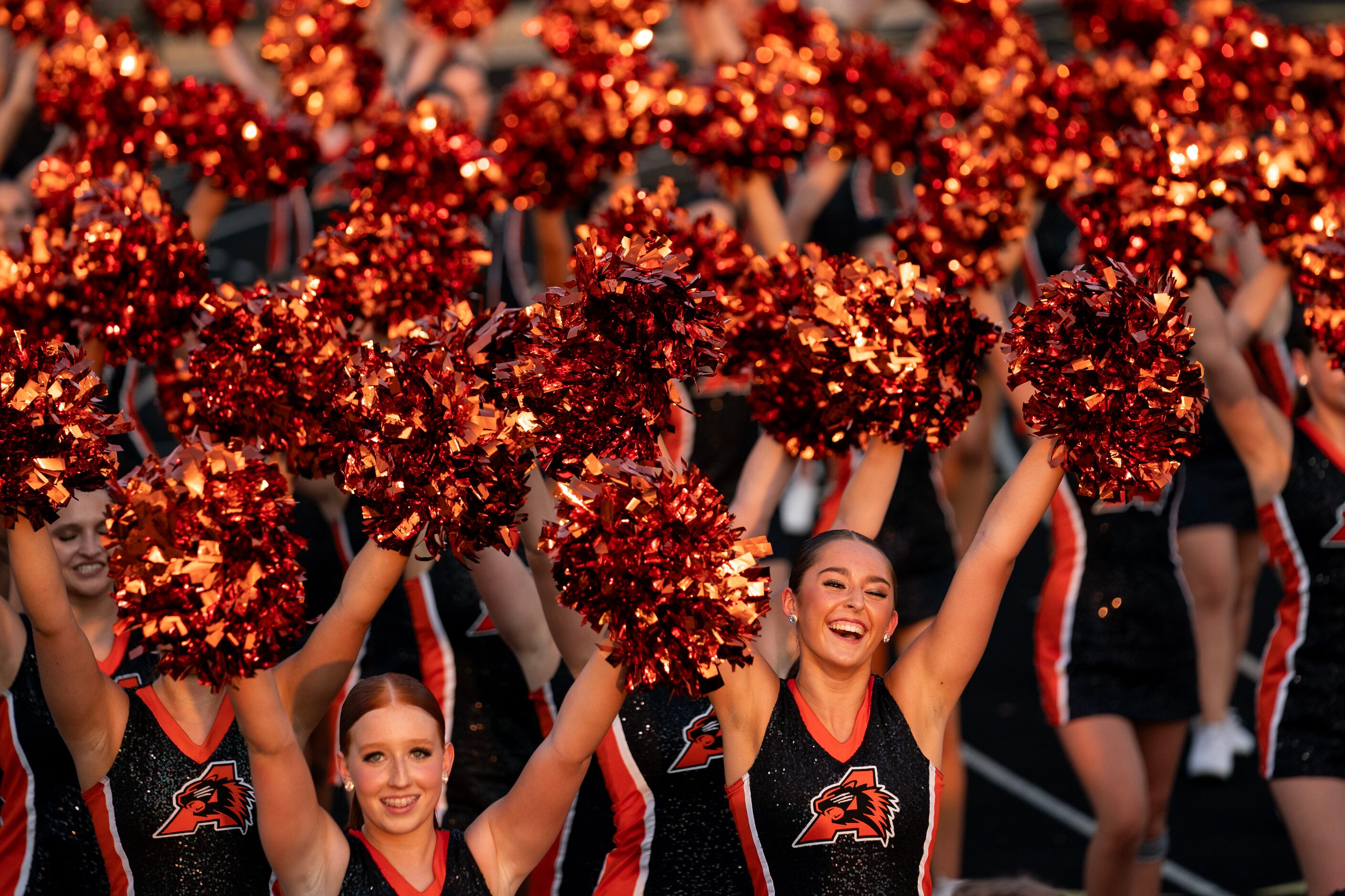 The Aledo drill team takes the field before a high school football game against Parish...