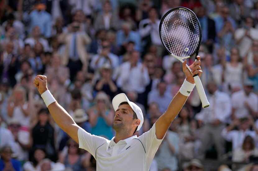 Serbia's Novak Djokovic celebrates after beating Australia's Nick Kyrgios to win the final...