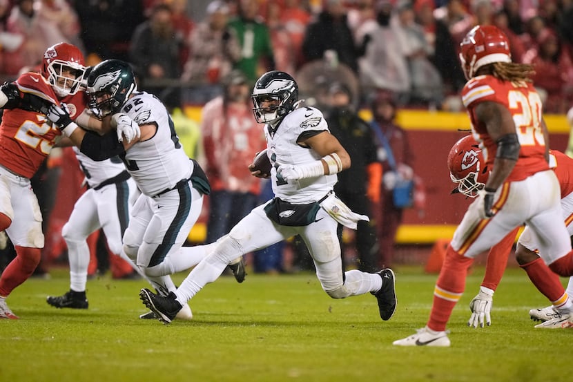 Philadelphia Eagles quarterback Jalen Hurts (1) runs with the ball during the second half of...